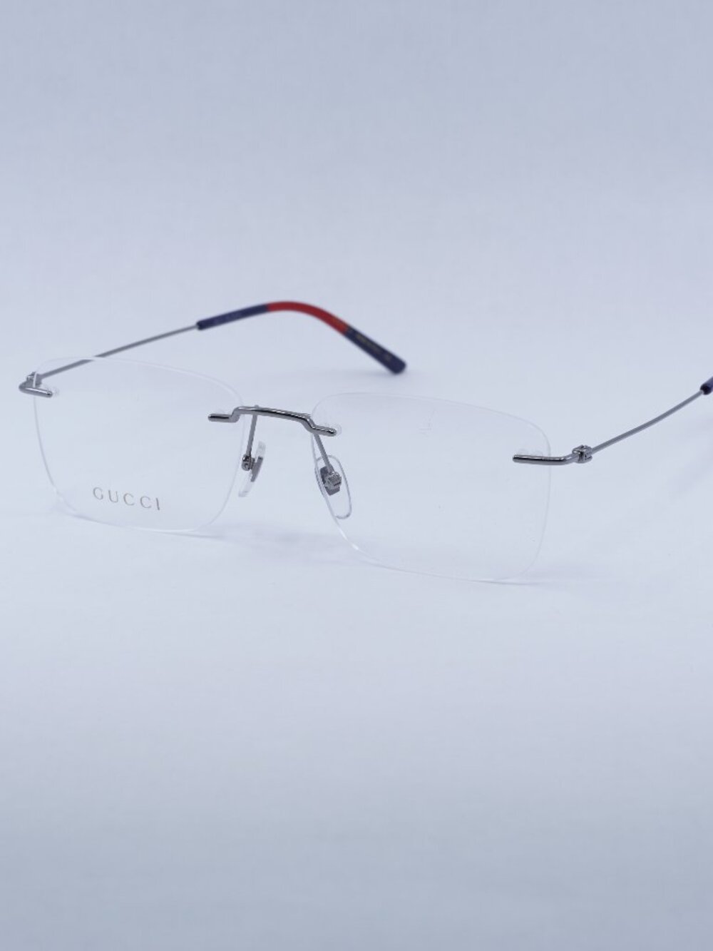 Gucci GG0399O 003 Rimless Eyeglasses Ruthenium 56mm Rectangle Frame